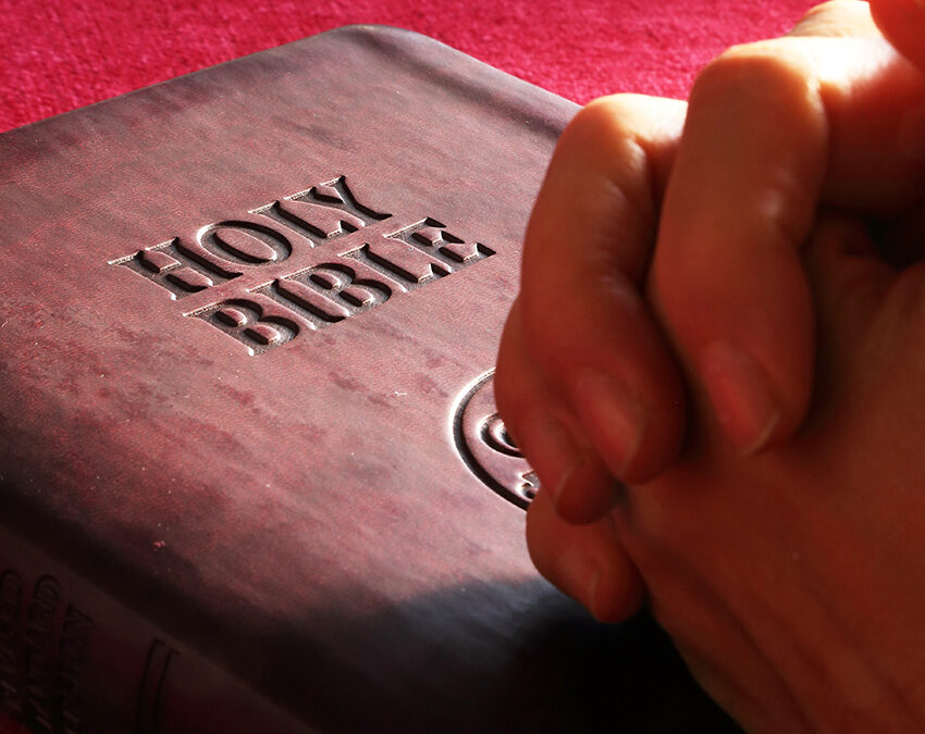 Bible_hands_prayer